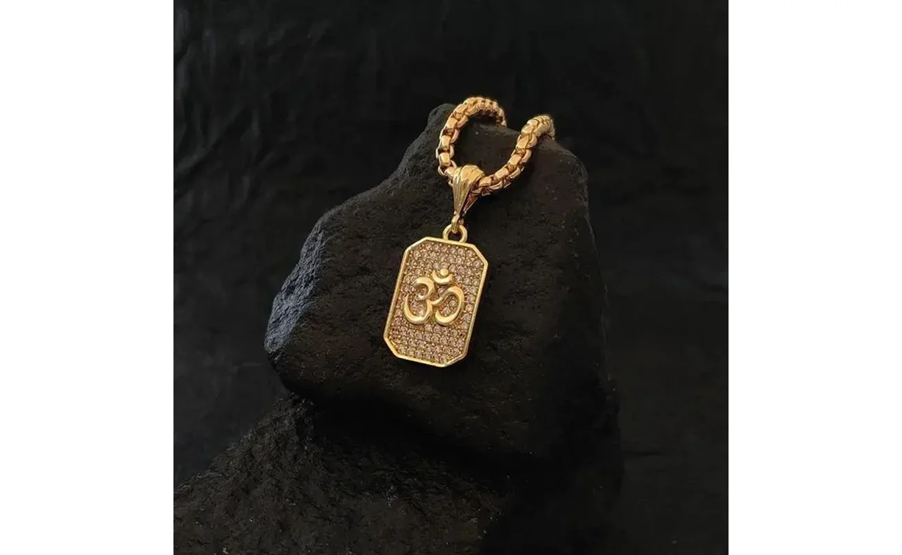 Gold Plated Om Diamond Pendant with Chain for Men | Stylish Religious Pendant with Alloy & Gold Finish | Om Locket Necklace for Daily Spiritual Wear, om pendant, om chain for men, gold plated om pendant, om diamond pendant, spiritual pendant for men, om locket for men, religious pendant chain, stylish om pendant, gold plated om diamond pendant with chain for men, stylish om locket with diamond design, spiritual om pendant necklace for men, religious om chain with gold polish, alloy om pendant with gold plating, om pendant chain for daily and casual wear.